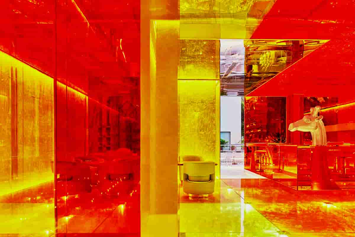Tourcoing Shoppers Immerse Themselves In The Transparent And Reflective Red And Yellow Market Areas