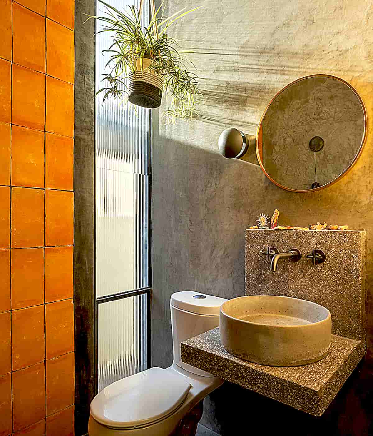 Architect Mauricio Alonso Uses Ceramics and Wood to Add Texture to a Concrete House in Mexic
