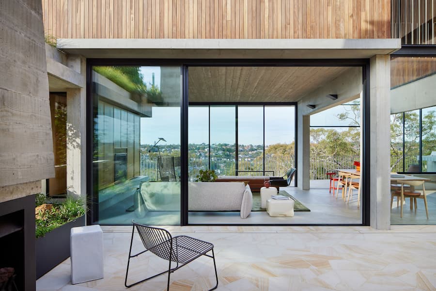 Castlecrag Courtyard: The house provides both a sense of protection and an immersive connection with the natural setting a harmonious blend of architecture and nature 