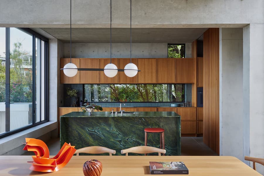 Castlecrag Courtyard: The house provides both a sense of protection and an immersive connection with the natural setting a harmonious blend of architecture and nature 