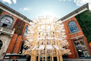 A Temporary Pavilion Made of 108 Deck Chairs Blooms Daily