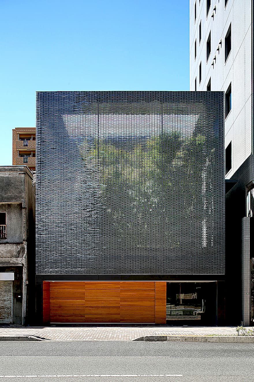 Hiroshi Nakamura's Hiroshima masterpiece: 6,000 glass blocks soften light, silence noise, and reveal a serene courtyard