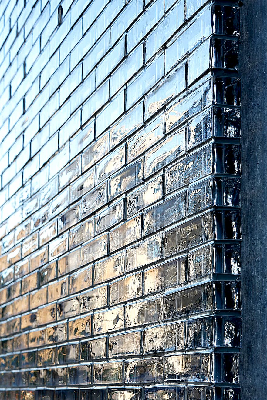 Hiroshi Nakamura's Hiroshima masterpiece: 6,000 glass blocks soften light, silence noise, and reveal a serene courtyard