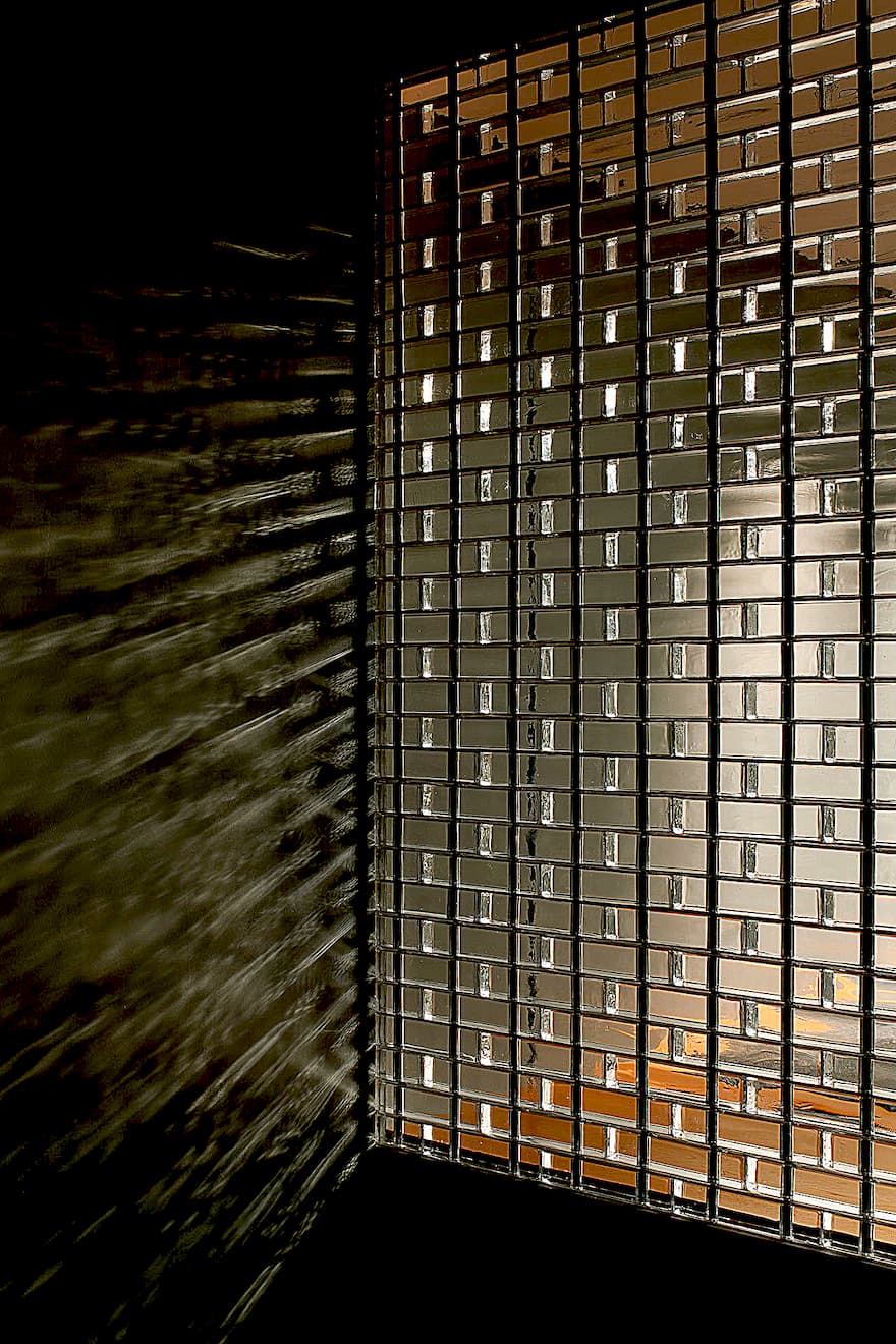 Hiroshi Nakamura's Hiroshima masterpiece: 6,000 glass blocks soften light, silence noise, and reveal a serene courtyard