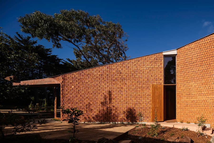 Burnt Earth Beach House Replaces a Dilapidated Beach Shack