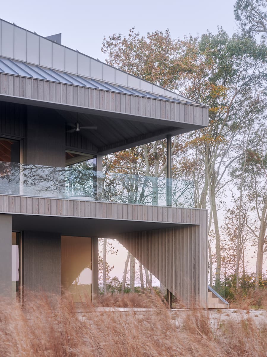 Tucked into its tree line is the Osprey House, a one-lane dirt road winds around the Preserve, culminating at this property at Cedar Island Cove.