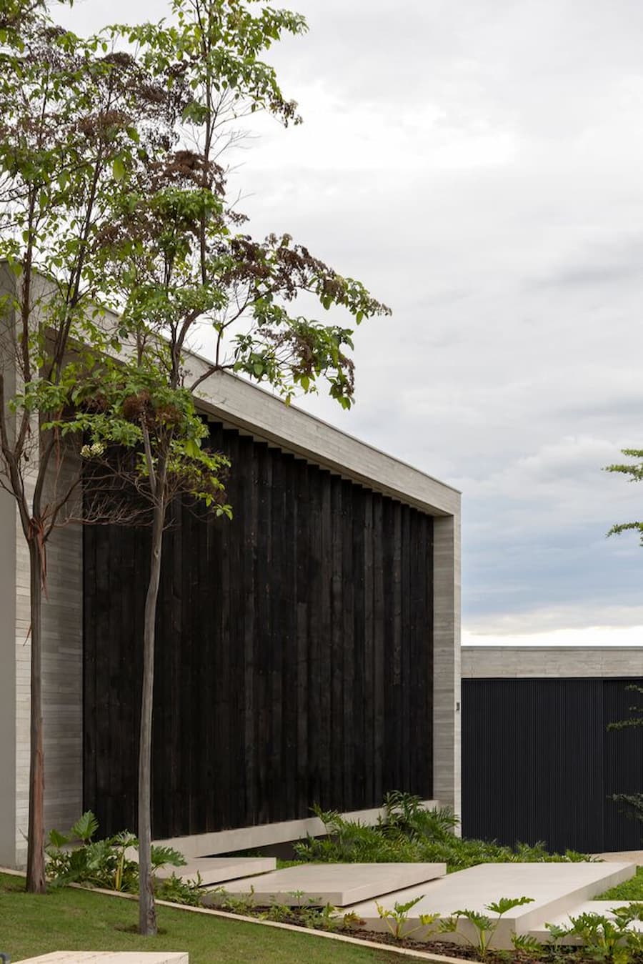 The JK House stands Out for its Palette of Refined, Natural Materials