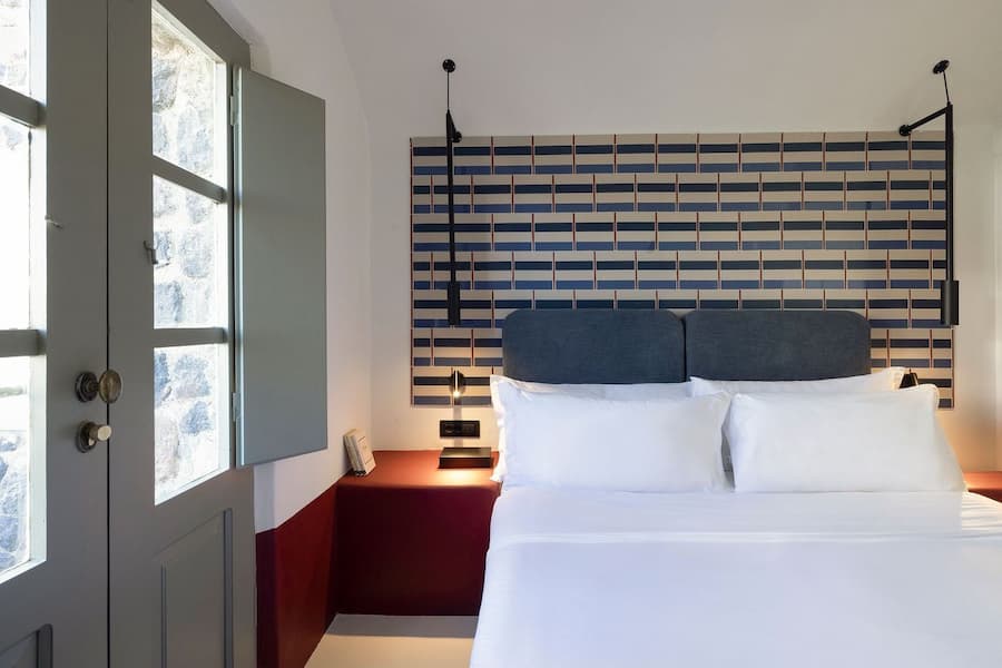 Light and space in Cycladic cave suite Santorini