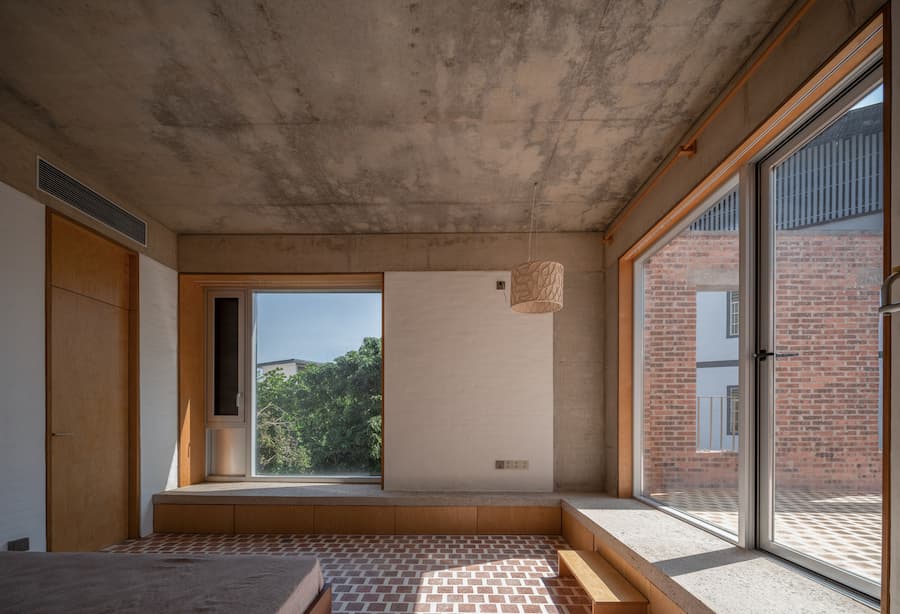 junction of concrete structure and brick wall detail