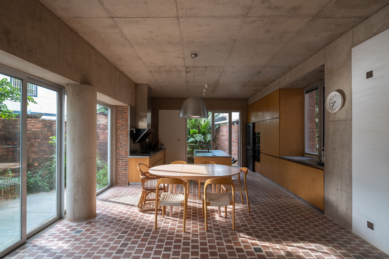 brick house massing with layered volumes and openings