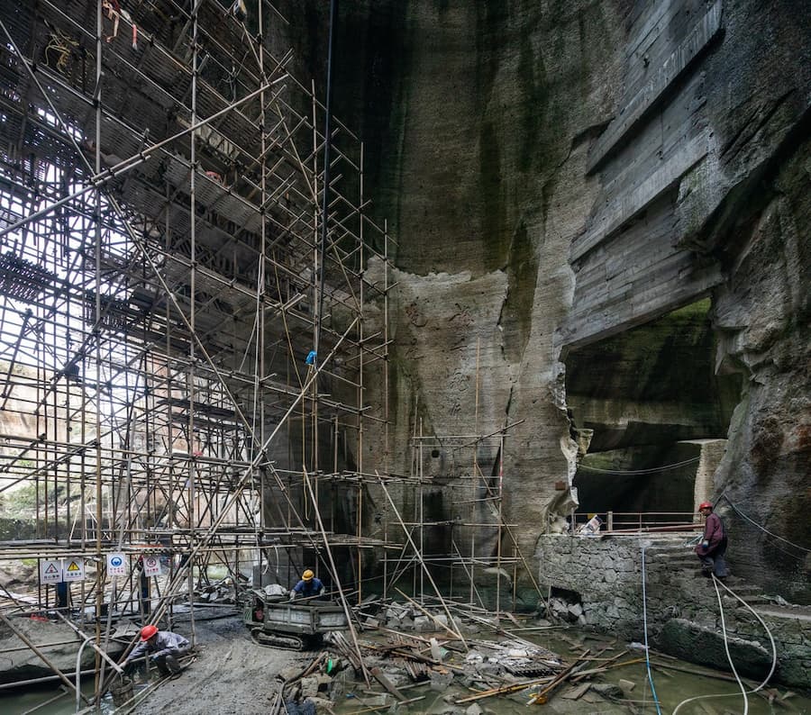 subsurface construction site exposing excavation processes and transformation of geological material