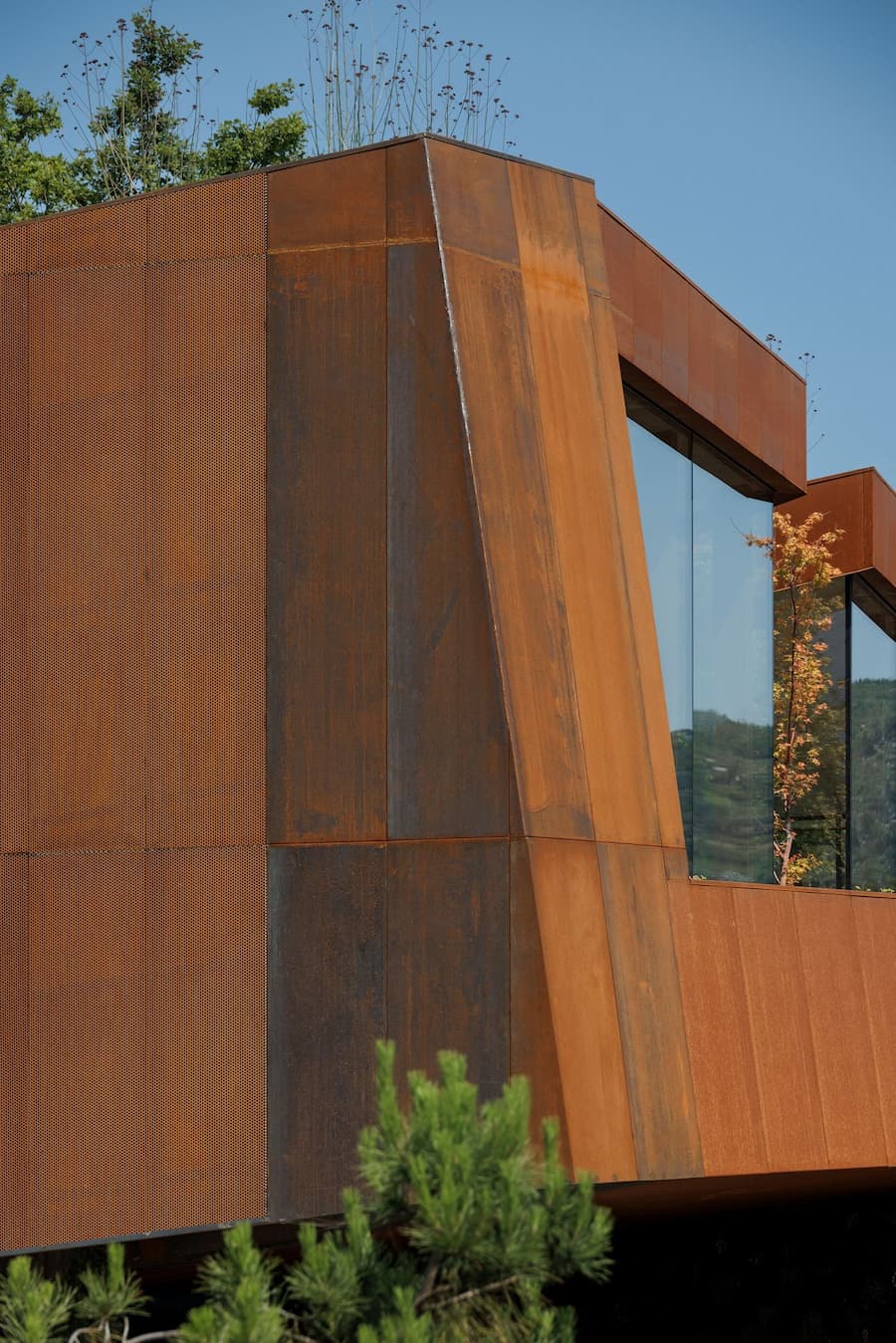 weathering steel facade detail showing oxidation and material texture