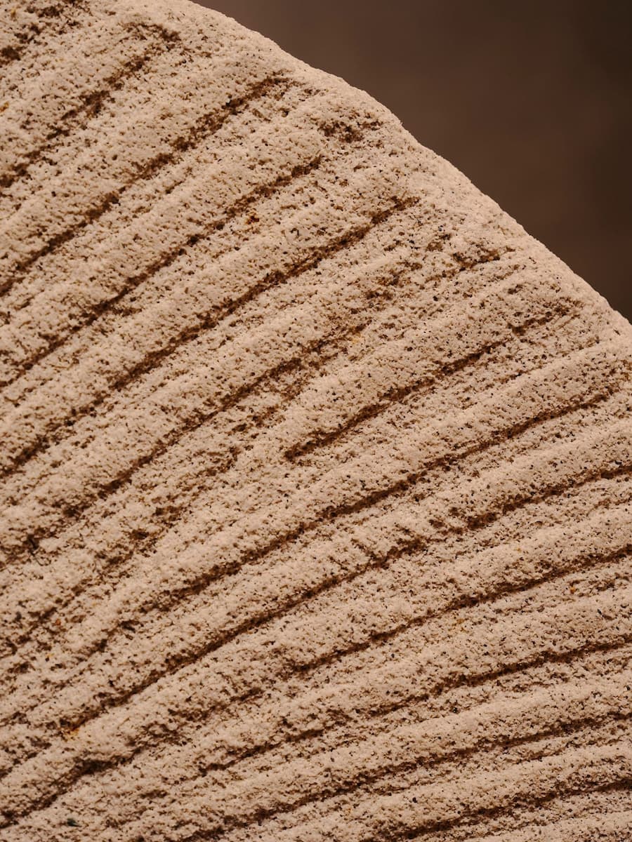 Close-up of textured stone surface in KEIT bakery Berlin