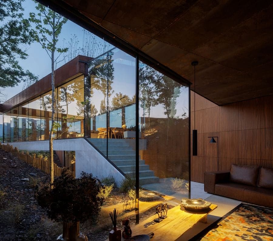 roof plan fragmented into geometric planes responding to topography and site conditions