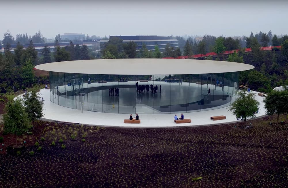 Apple Park visitor pavilion with transparent circular glass structure