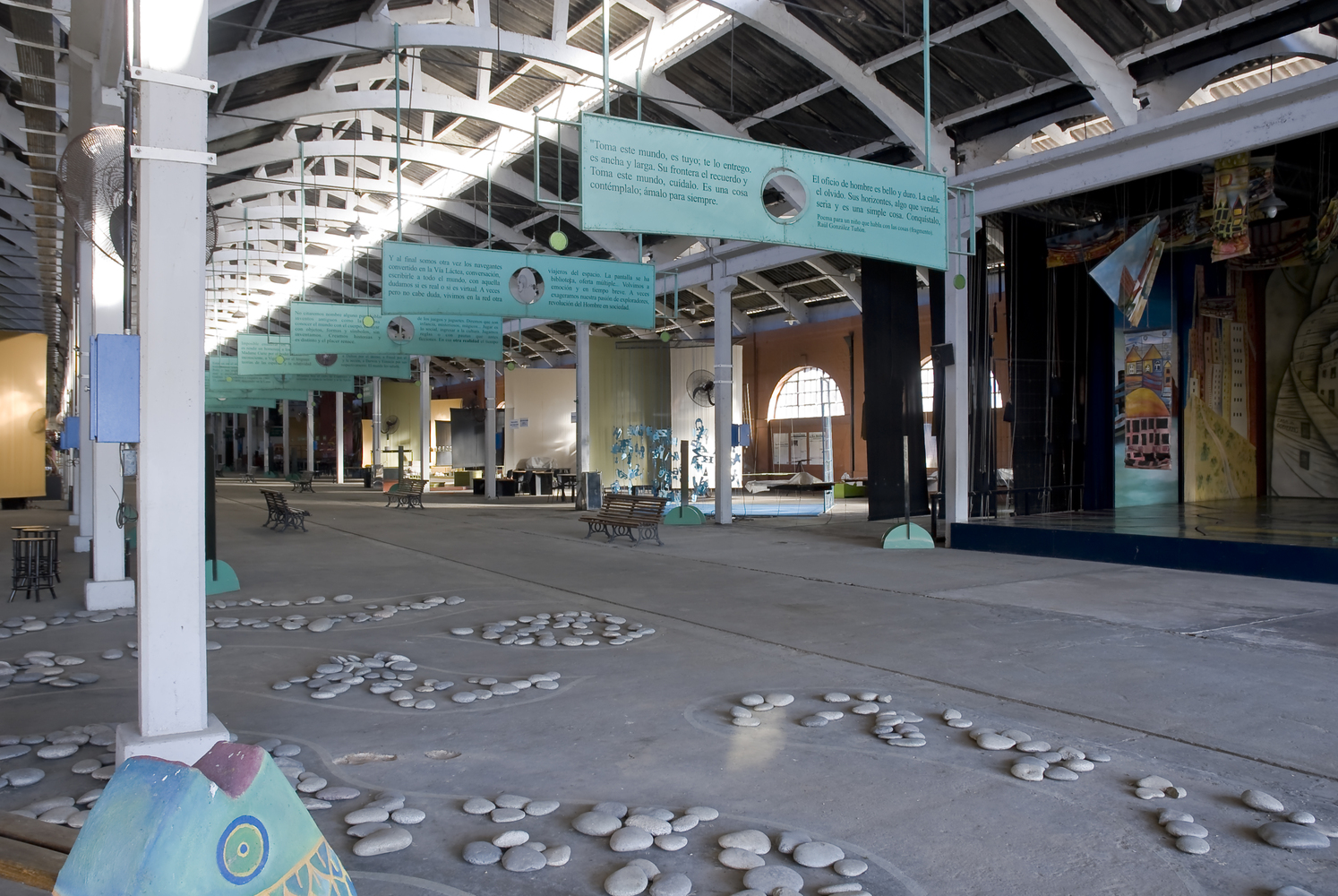 adaptive reuse interior combining exhibition space public circulation and preserved industrial structure