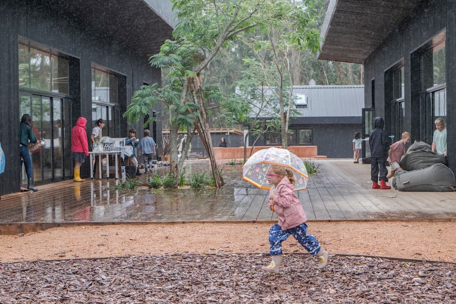 educational architecture integrated with landscape, water systems, and natural topography