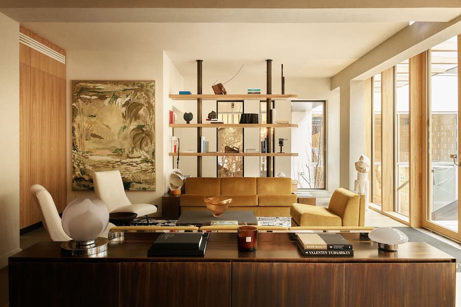Warm-toned suite living room at La Fondation hotel in Paris