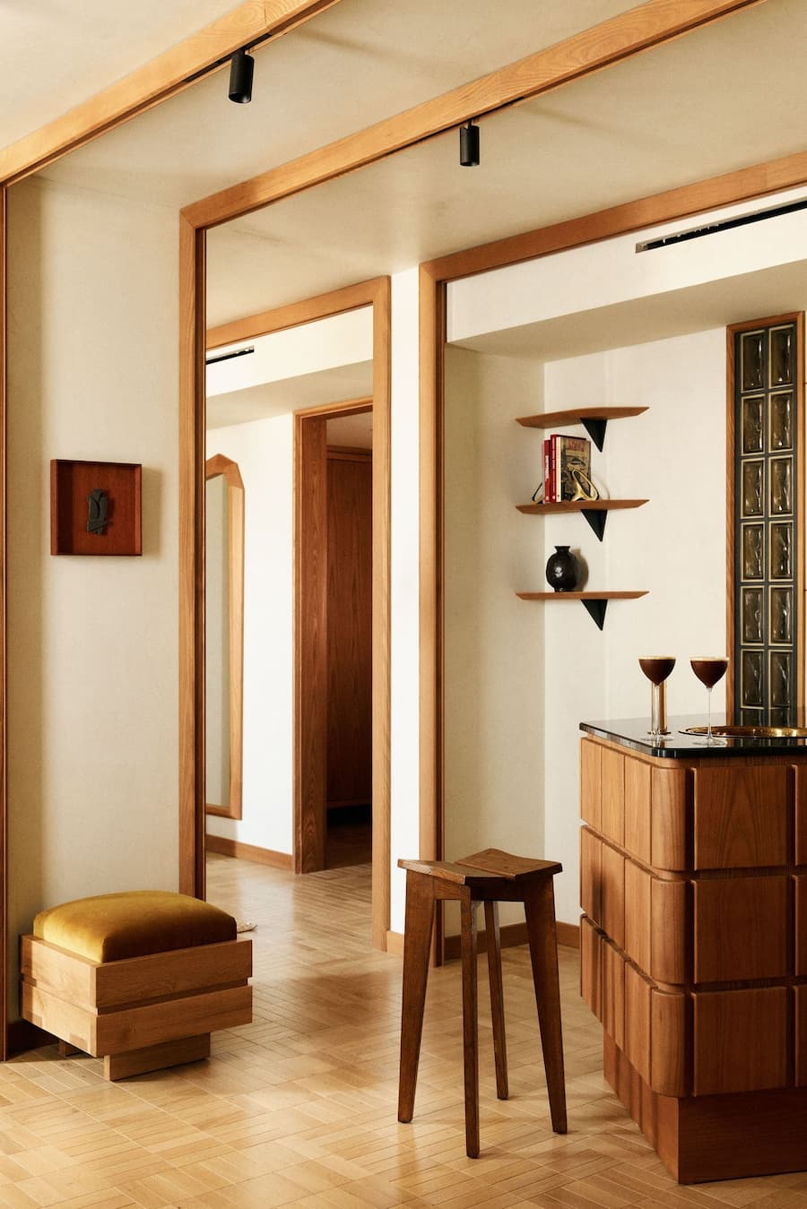 Apartment-style hotel interior with timber detailing at La Fondation Paris