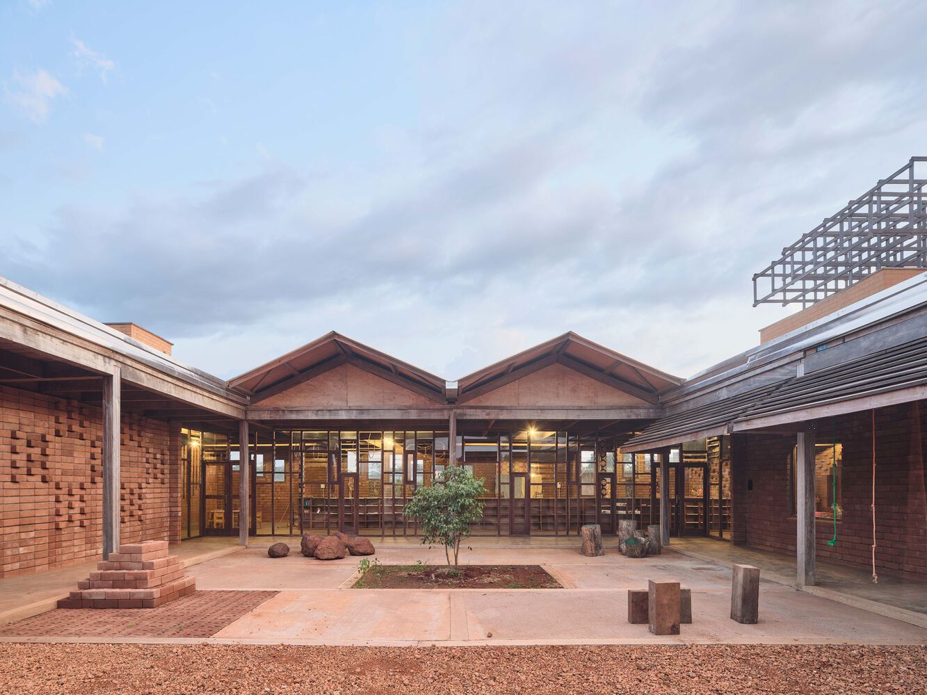 open brick courtyard designed as shared learning and gathering environment