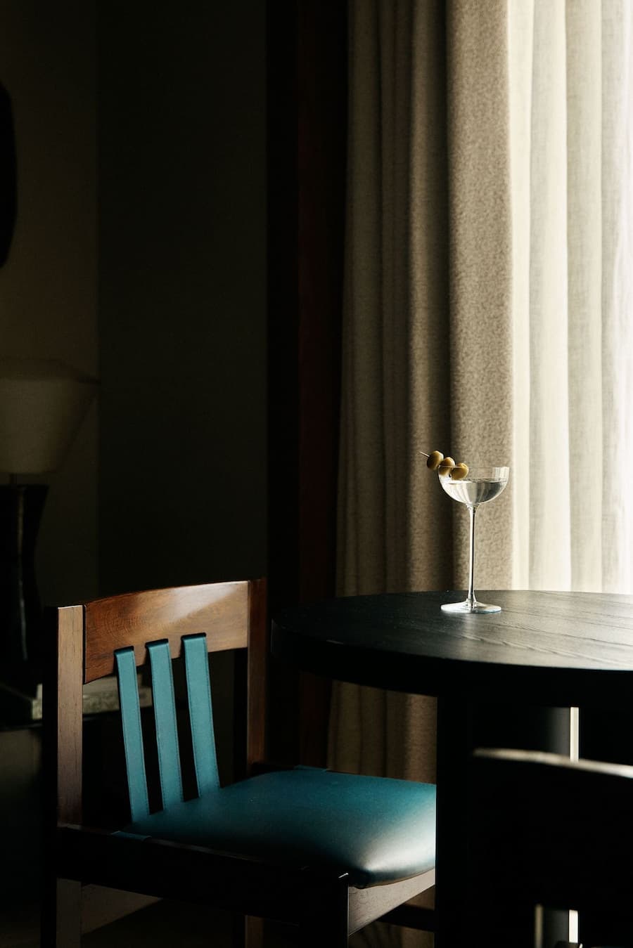 Dining corner and soft interior lighting inside La Fondation suite