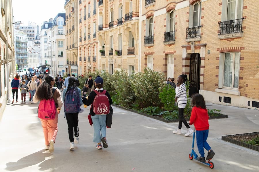Children using a redesigned school street in Paris