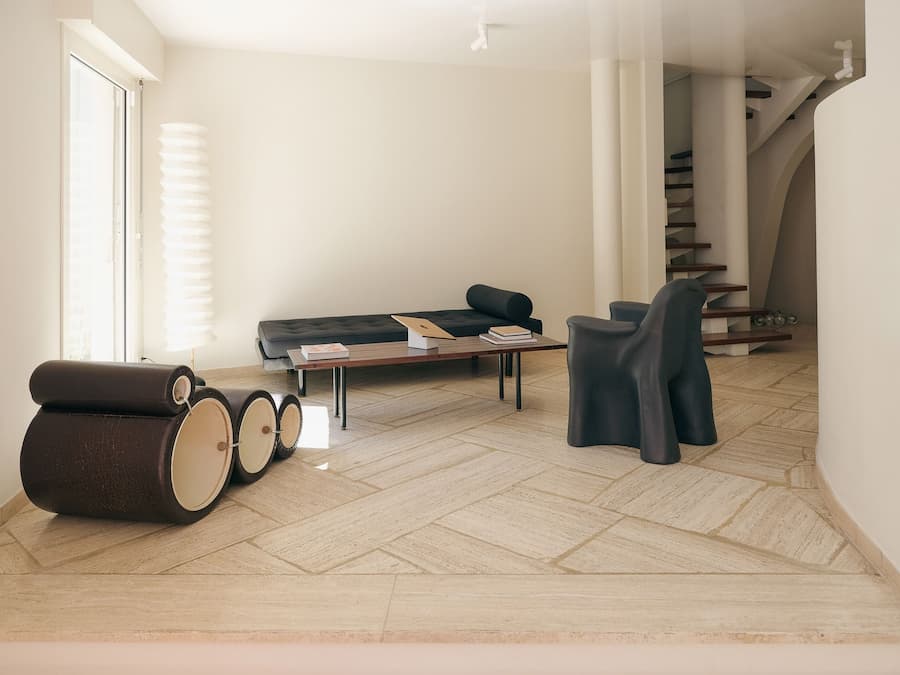 Curated lounge at Casa Ideale featuring collectible contemporary furniture inside Villa Bank