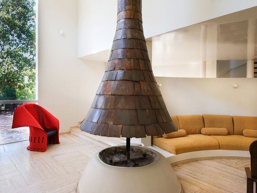 Split-level interior at Villa Bank connecting the dining room through Émile Sala's flowing architectural layout