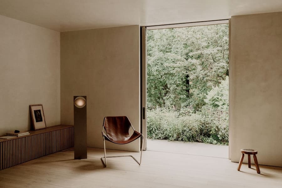 Quiet lounge corner opening directly onto the lush garden at Barrancas House