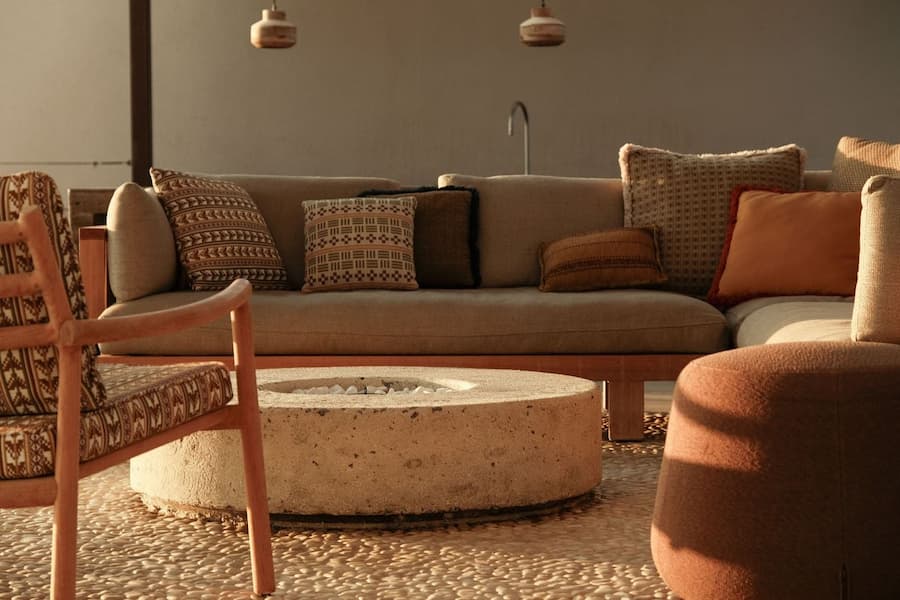 Villa pool terrace and guest wing illuminated by warm evening light