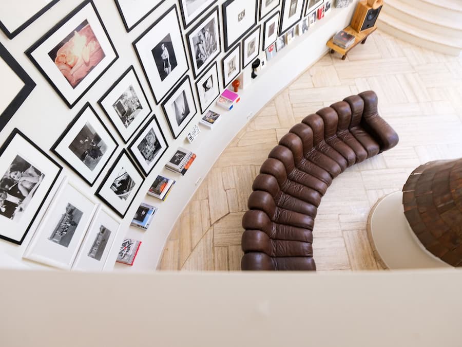 Overhead view of the De Sede DS-600 sofa beneath the photography gallery inside Villa Bank