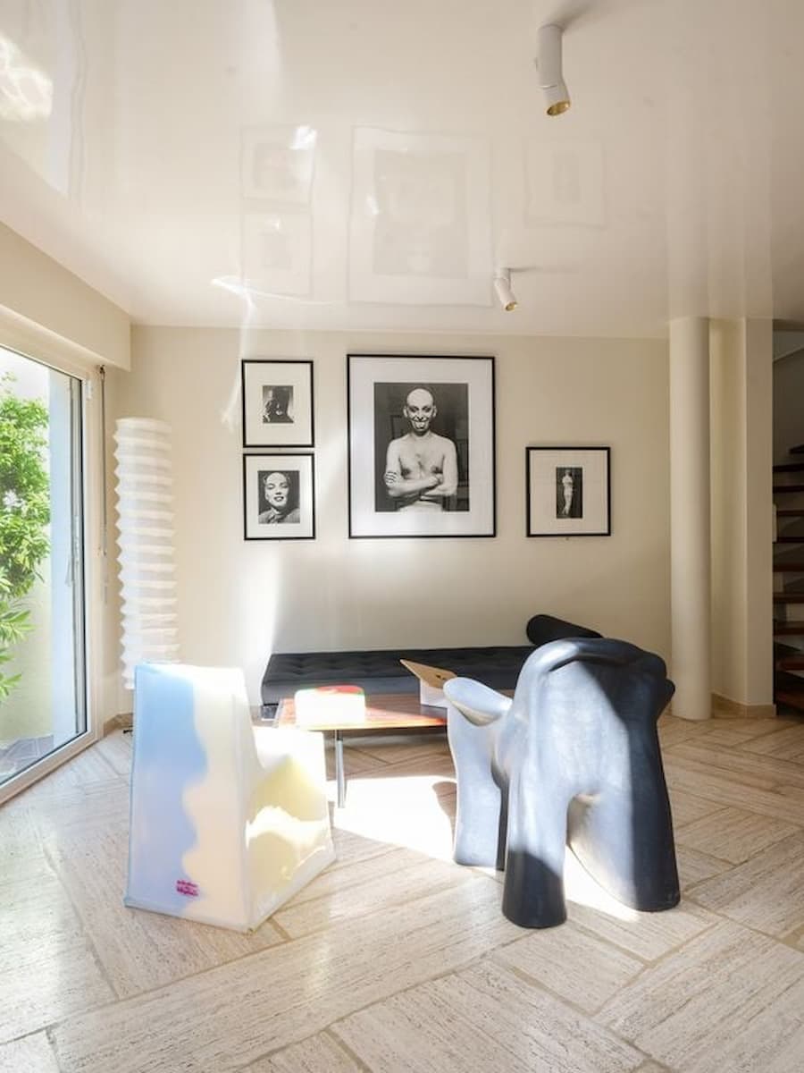 Collectible design lounge at Villa Bank featuring contemporary seating within Casa Ideale