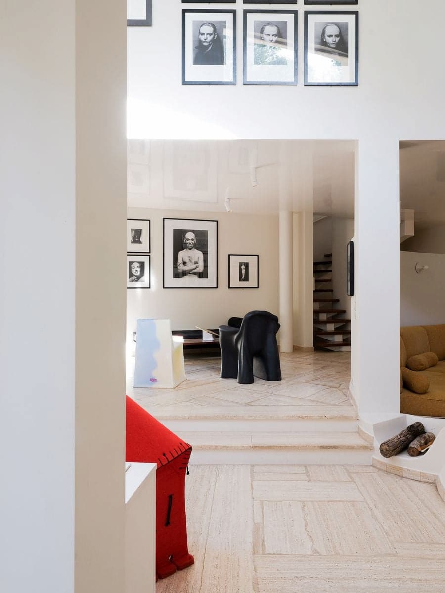 Layered living spaces at Villa Bank connecting the photography gallery with collectible design furniture