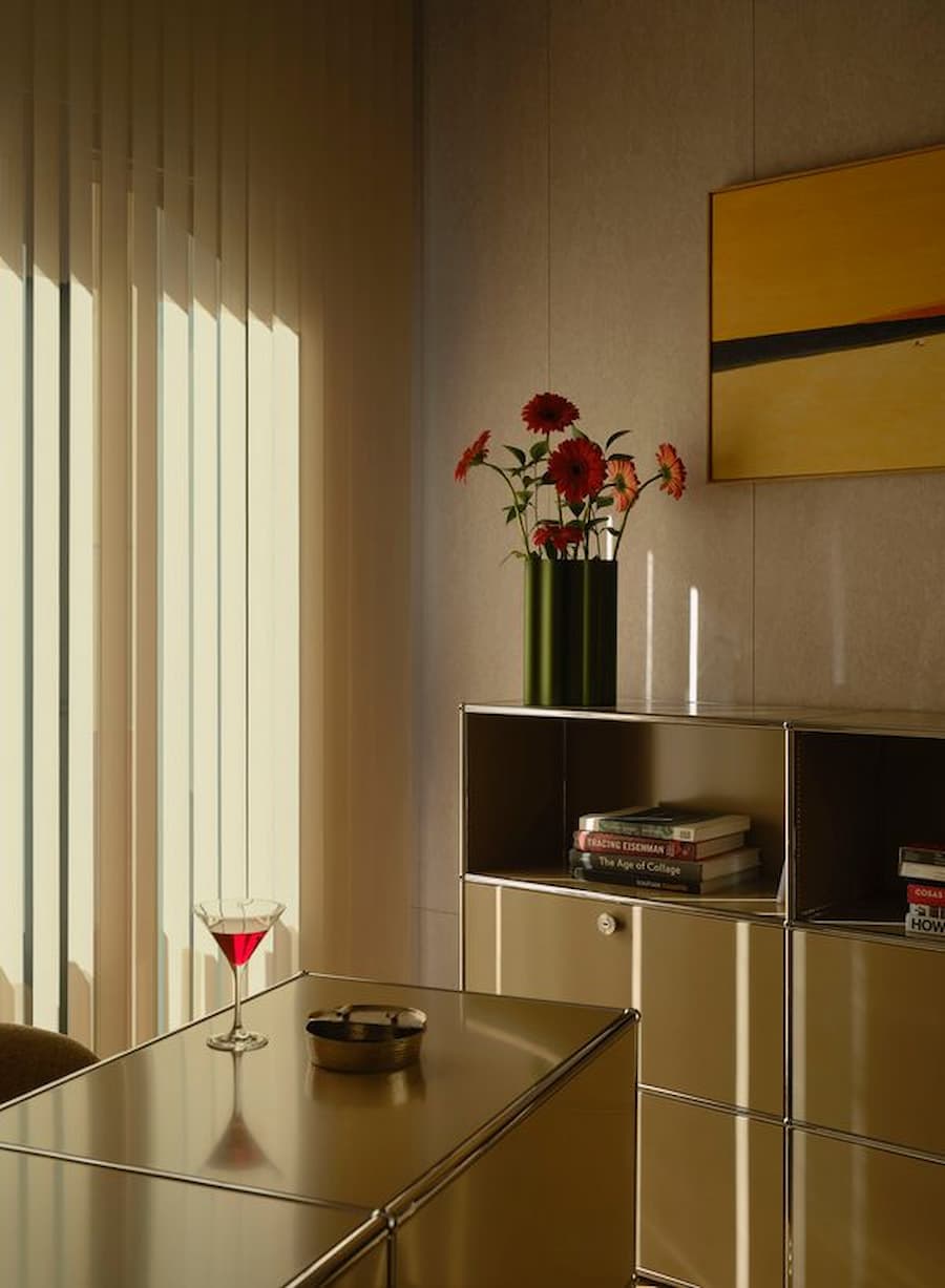 Home office featuring USM modular storage, soft daylight and minimalist contemporary furnishings.