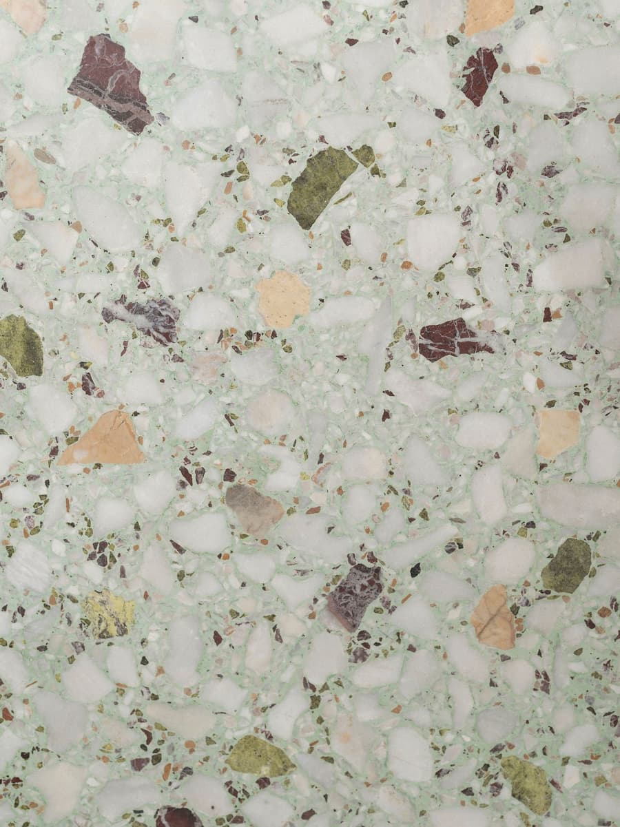 Custom terrazzo flooring detail featuring natural marble aggregates at YAPA Antiparos, Greece