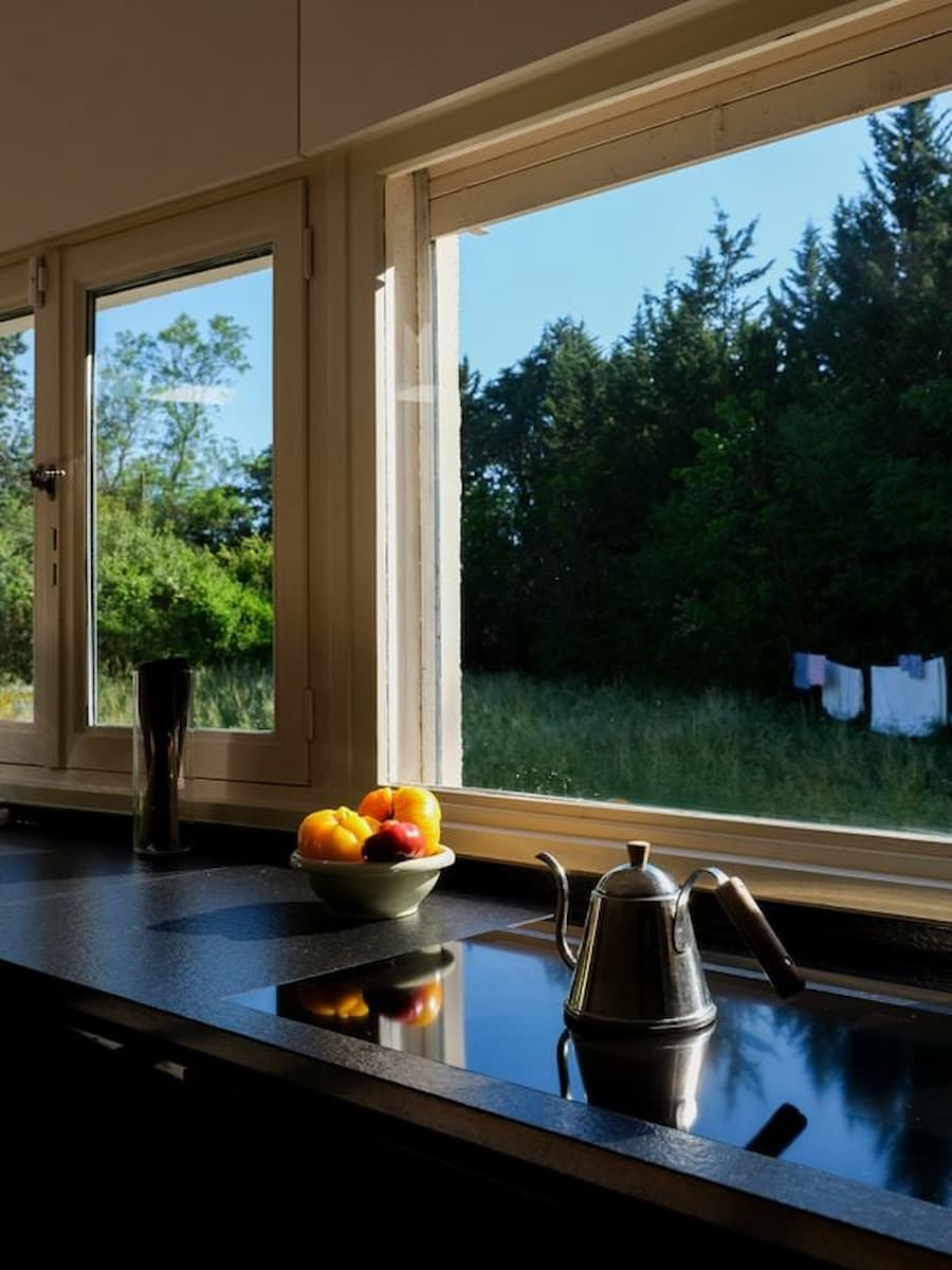 Kitchen overlooking the Provençal landscape inside Villa Bank at Casa Ideale