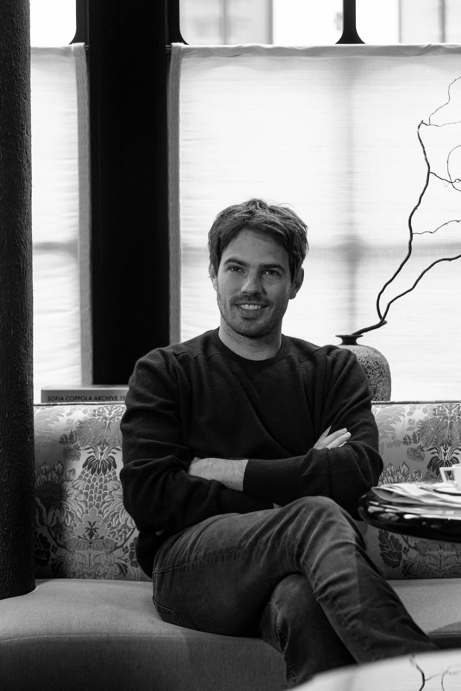 Black-and-white portrait of the founder behind Bus Palladium Hotel Paris