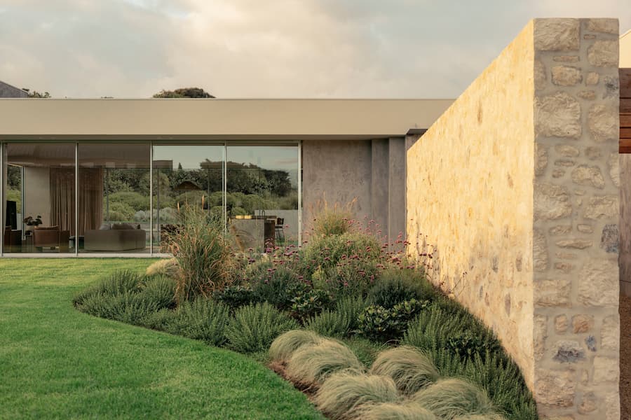 Open living pavilion connecting indoor and outdoor spaces at Wildcoast Residence.