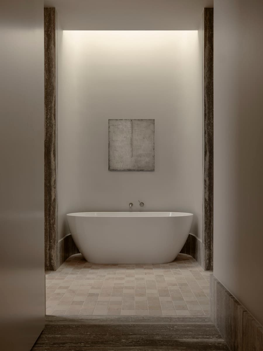 Minimal bathroom illuminated by soft natural light at Wildcoast Residence.