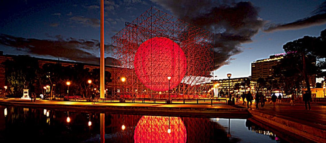 tierra earth a luminous red sphere caged inside a structure